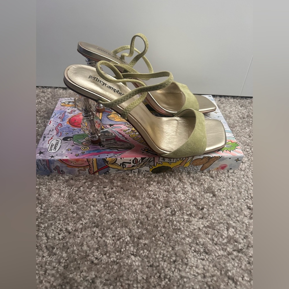 Jeffrey Campbell heels with green straps, and a clear and gold chandelier heel.
